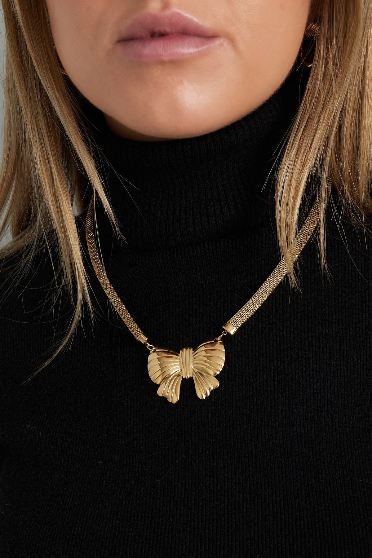 Big statement bow ketting goud/zilver