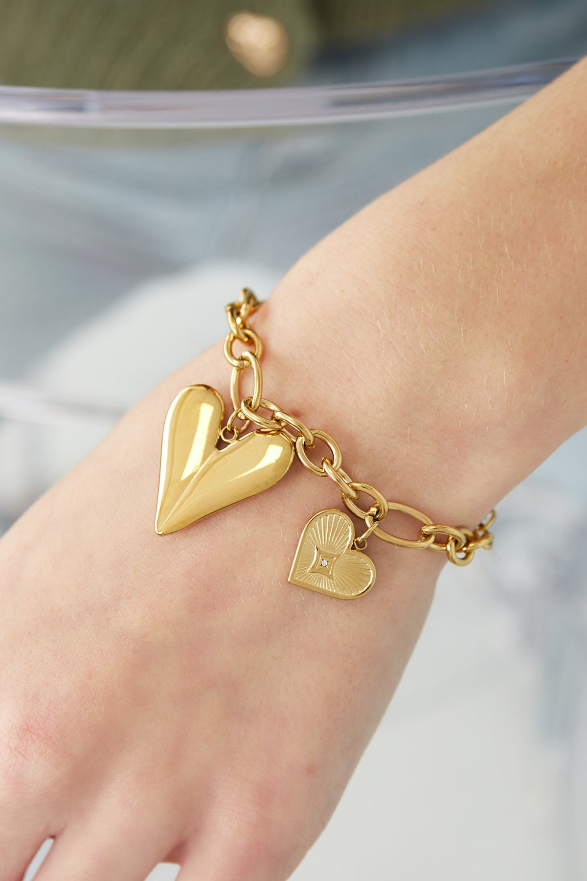 Bedelarmband triple heart goud/zilver