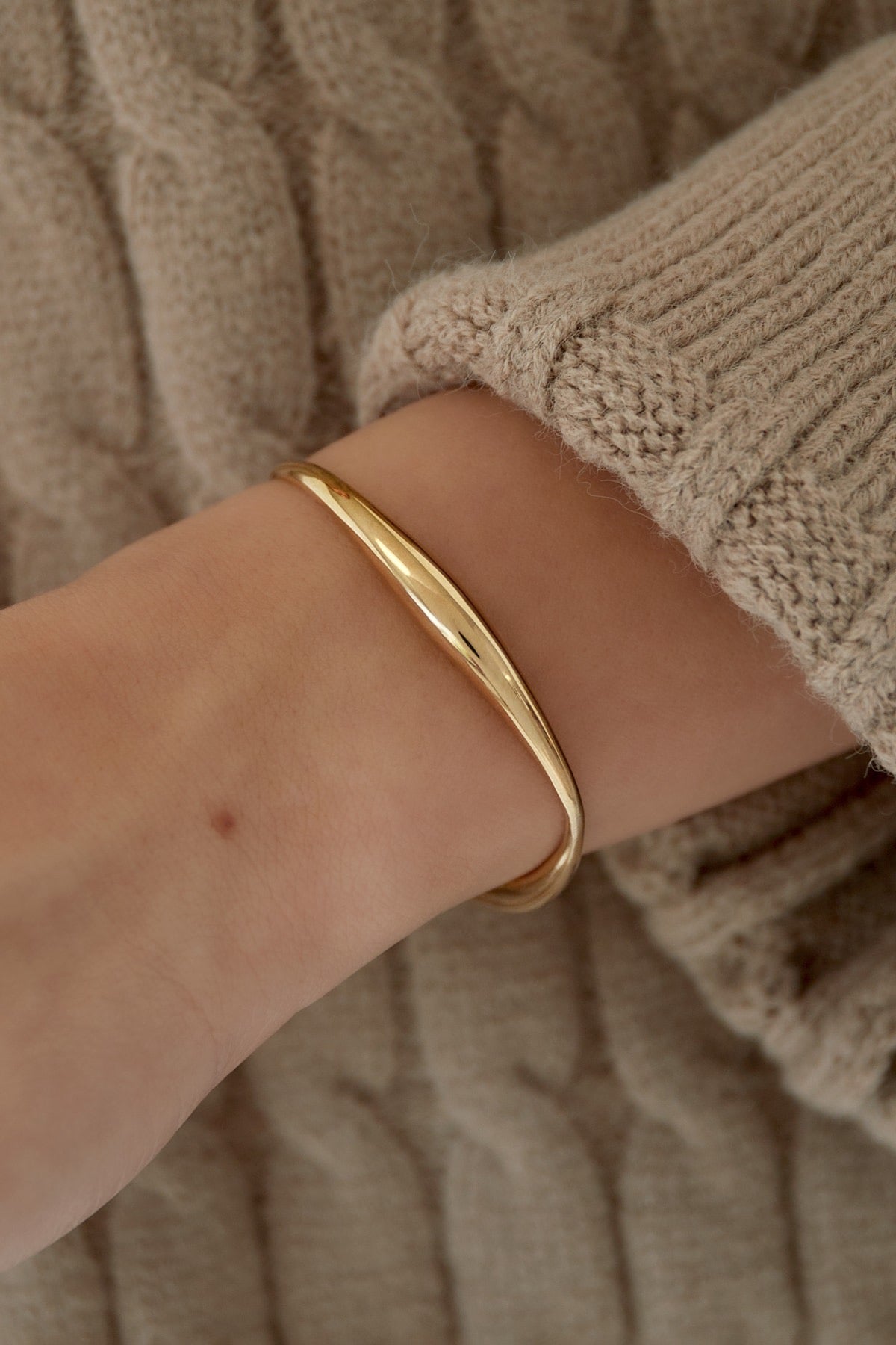 Organische vorm armband goud/zilver